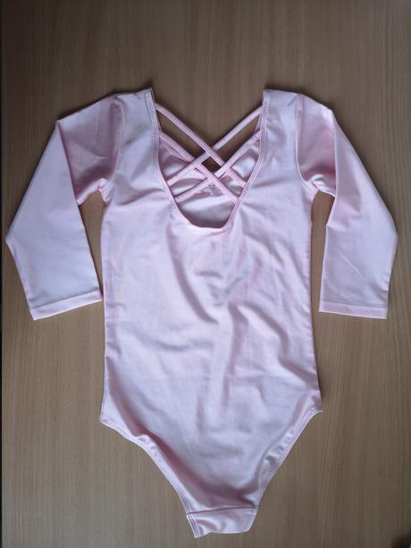 Svetloružový trikot z lesklého džerseja v. 122/128, 122