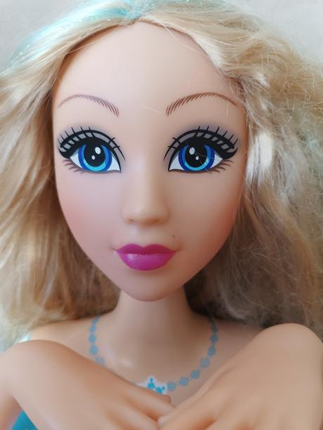 Česacia hlava -bábika, 