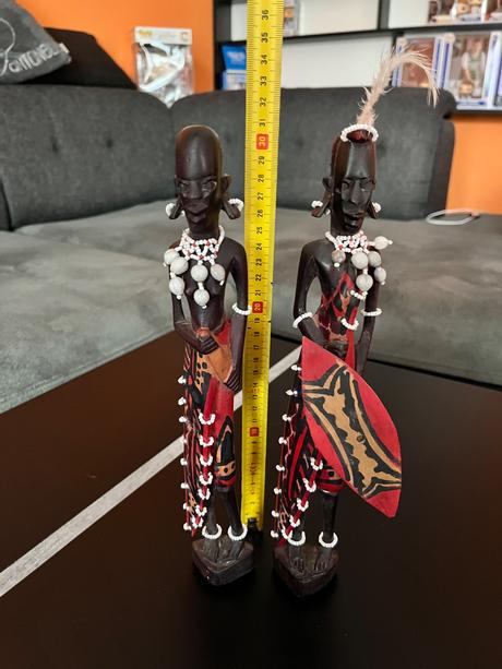 Drevené sošky masajov, 