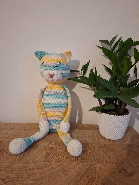 Háčkovaná mačka, 