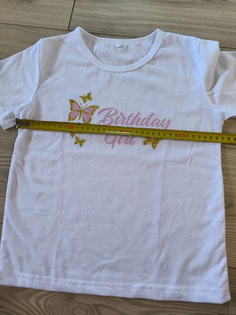 Narodeninove tričko, 128