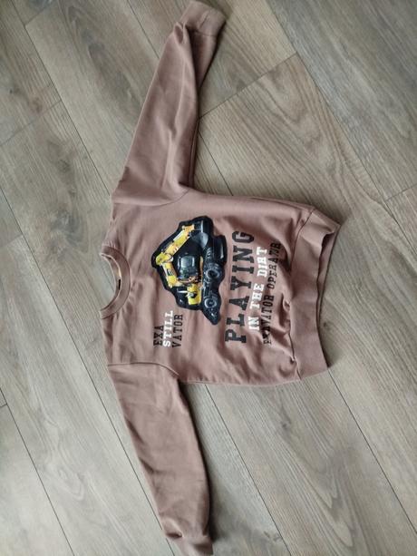 Blikajúca mikinka, 98