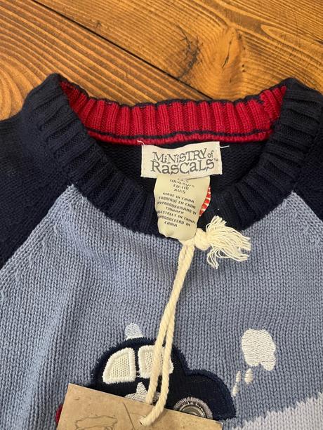 Svetrík s autami, 98