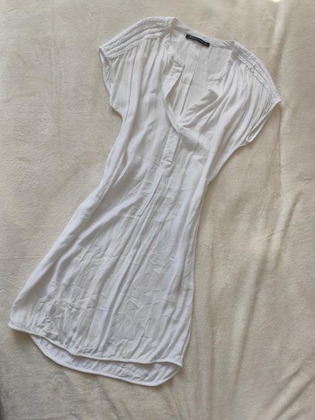 Balík oblečenia zeny, s