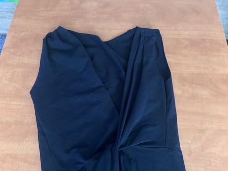 Zaujímavá asymetrická vesta, l