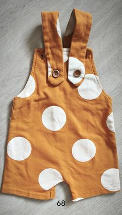 Krátke nohavice na traky, 68