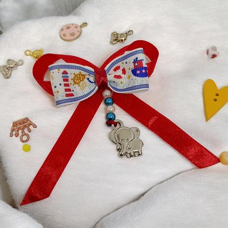 Mašlička na kočík s príveskom, 