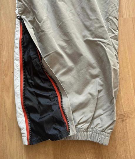 Šuštiakové nohavice/ šušťaky/ športové nohavice, s