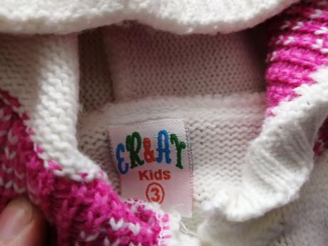 Svetrík s brmbolcami, 98