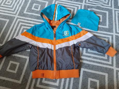 Tenka bunda s ciapkou, 92