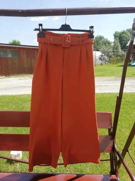 Nohavice tehlovej farby, 42