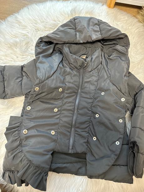 Prechodná  bunda s volanikmi, 110