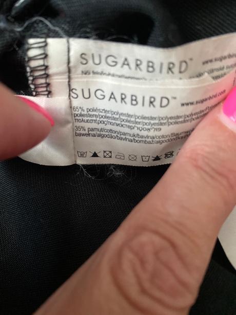 Dlhá čierna bunda sugabird, sugarbird