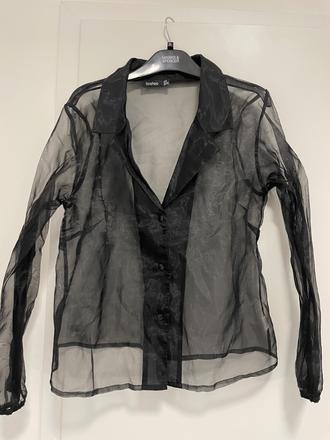 Priesvitná blúzka, 44