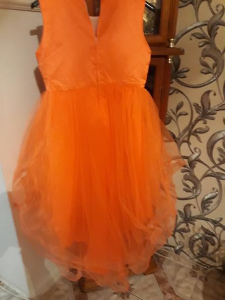 Oranzove saty s aplikacoiu, 140