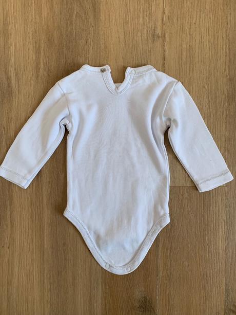 Biele body so strieborným lemom, 62