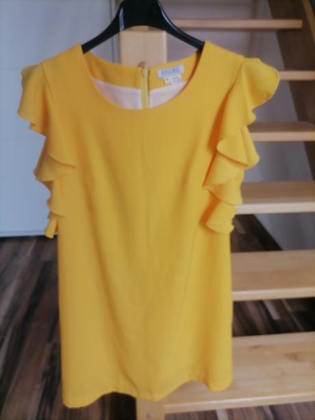 Šaty s volánmi, 36