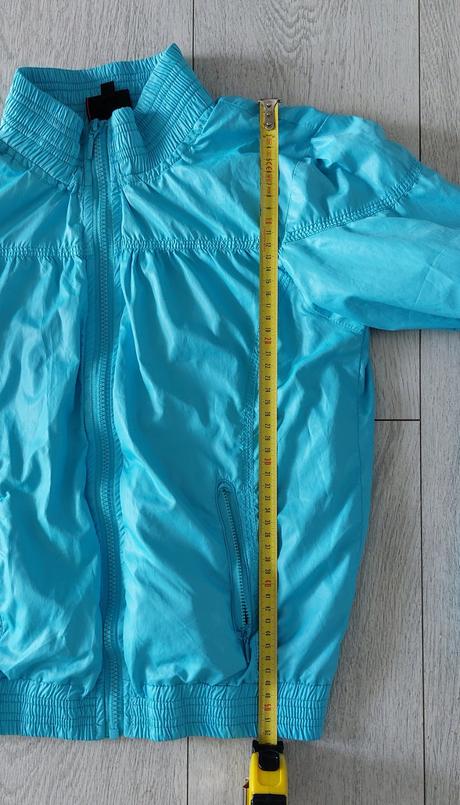 Tenká moderná bunda do pása, 164