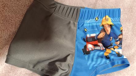 Plavkové šortky, 92