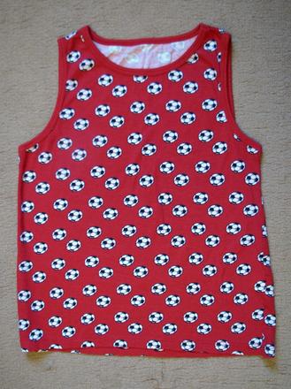 Tielko s futbalovými loptami, 98