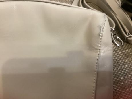 Taska s malým poškodením,