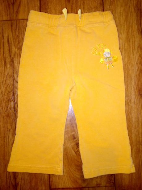 Oranžovo-žlté teplaky s dievcatkom 80 top stav, 80