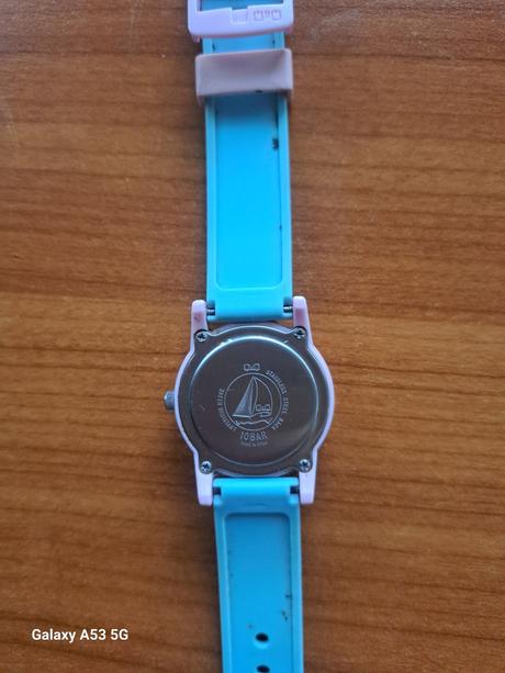 Hodinky s macickou zn.q / q, 