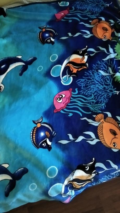 Krásna modrá deka more so zvieratami,