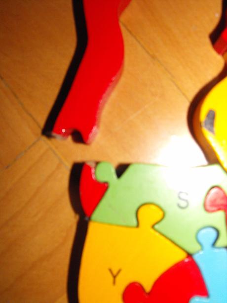 Drevený puzzle lev,