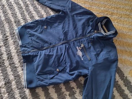 Prechodná tenká bunda, 122