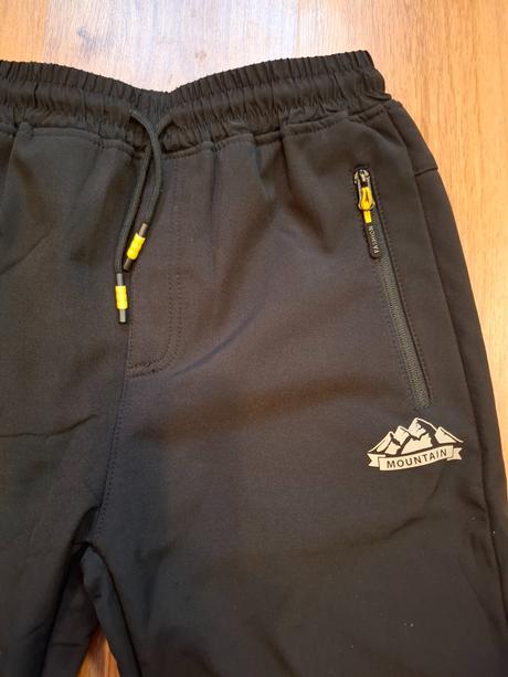 Zateplené športové nohavice v.164, 164